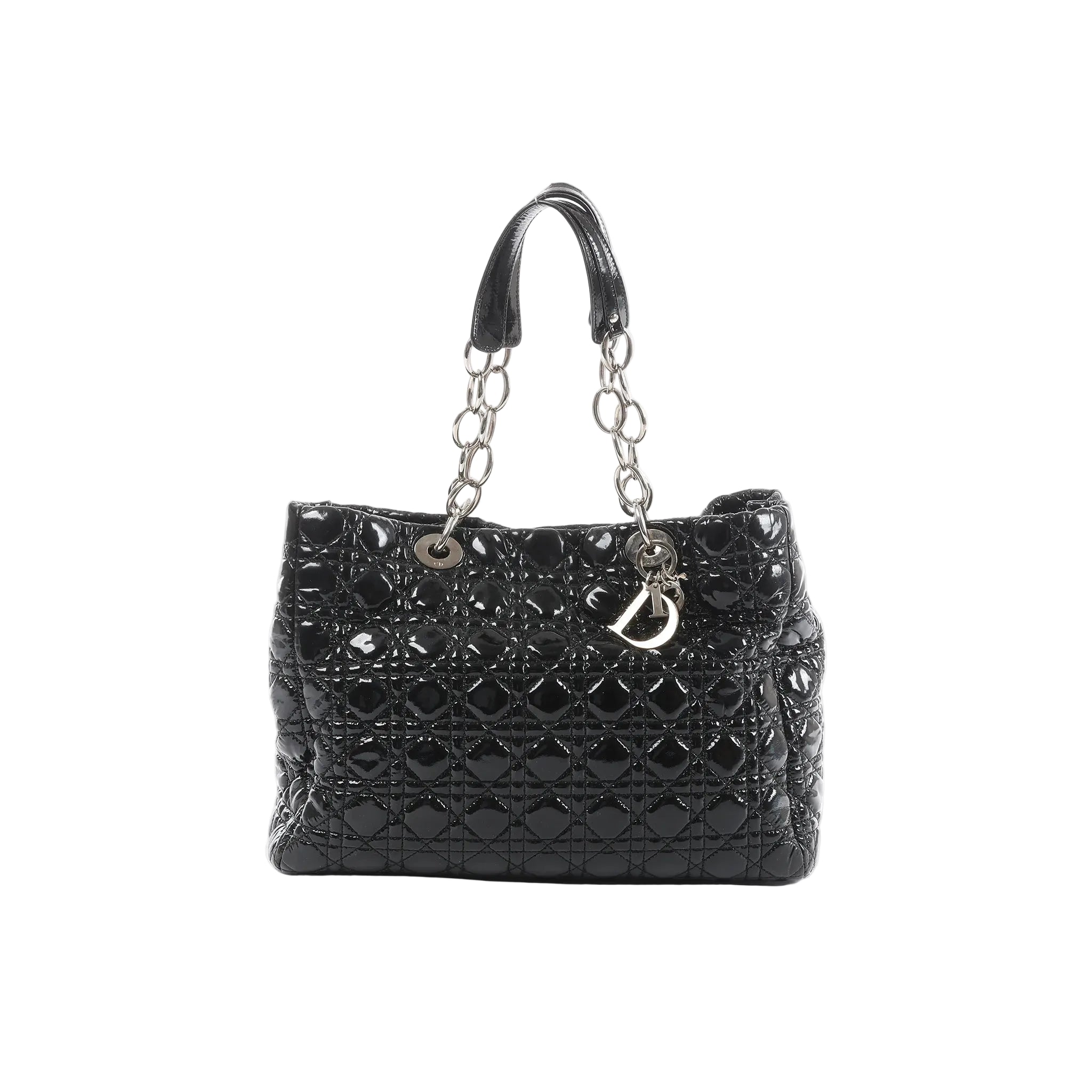 Front view of Dior Soft Lady Dior Large bag in black patent leather with Cannage quilting, silver-tone chain-and-leather handles, and hanging D.I.O.R. letter charms.