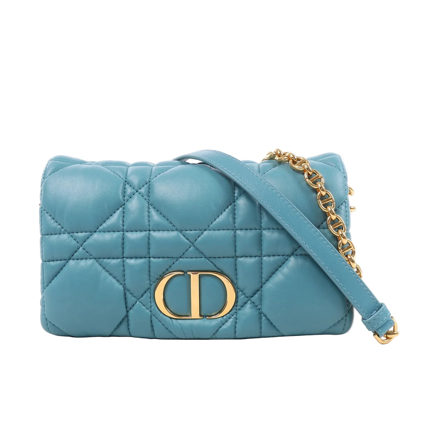 Front view of a blue Christian Dior Caro Macrocannage leather shoulder bag, featuring quilted stitching, gold-tone CD logo hardware, and a matching leather and chain strap, displayed against a white background.