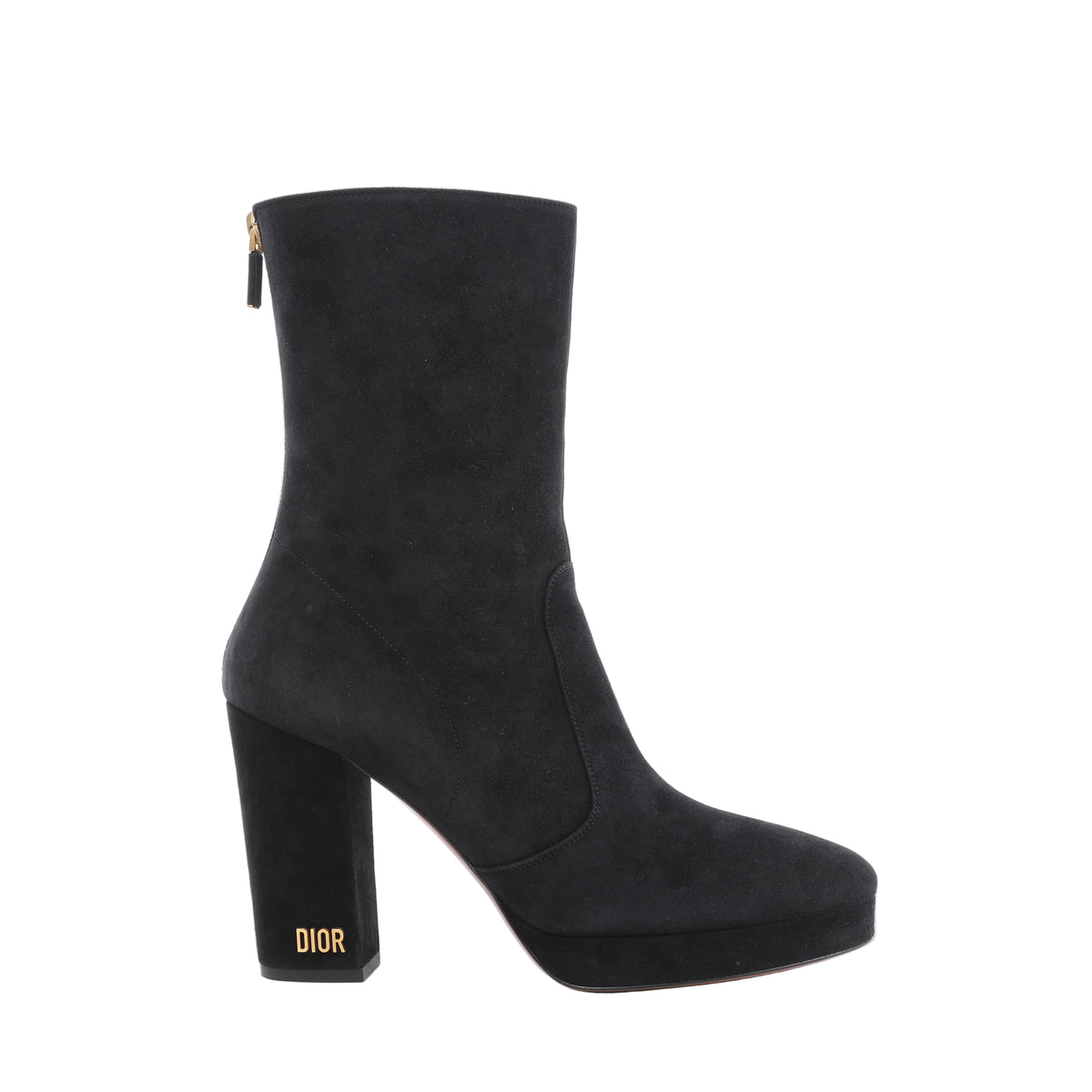 Side view of a black suede Dior boot with a rounded toe, front platform, tall block heel, gold-tone DIOR heel lettering and a back zip.