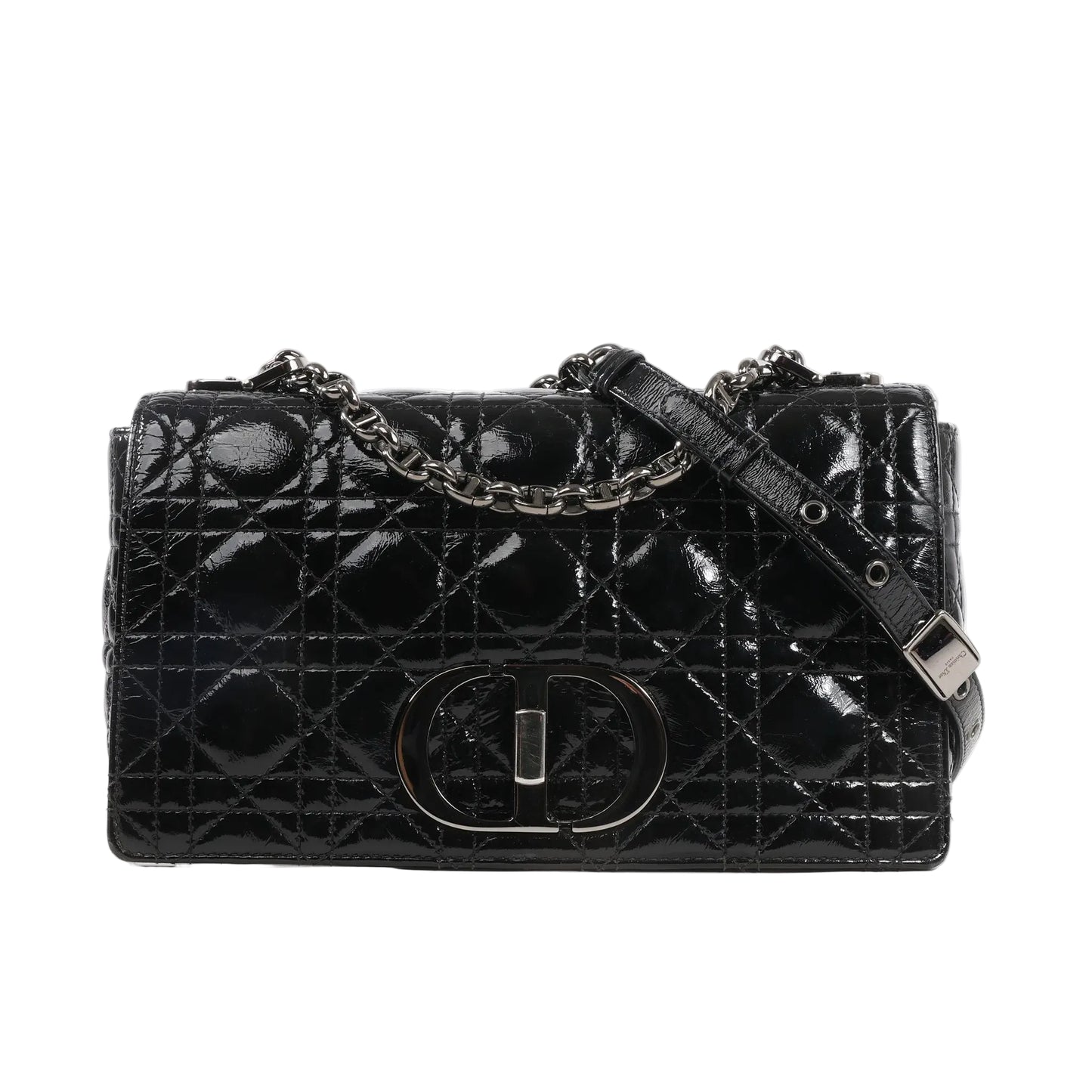 Dior Caro black patent leather crossbody bag featuring signature Cannage quilted stitching, antique silver-tone CD logo clasp, and adjustable chain strap.