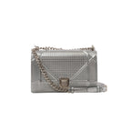 Metallic silver Dior Diorama Cannage patent leather crossbody bag with geometric quilting, shield clasp and silver-tone chain shoulder strap.
