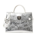 Front view of Christian Dior Diorever Medium Leather 2Way Handbag in metallic silver, featuring a structured design, top handle, detachable shoulder strap, and signature Dior clasp closure against a white background.