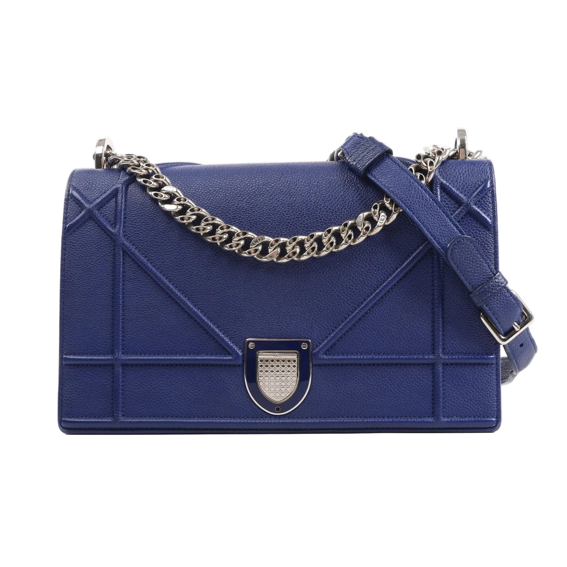 Dior Diorama shoulder bag in navy blue leather featuring geometric cannage stitching, silver-tone chain and leather strap, and signature crest-shaped clasp, displayed against a white background.