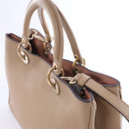 Bolso de mano mediano de dos vías de piel Cannage de Christian Dior en color camello