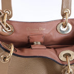 Bolso de mano mediano de dos vías de piel Cannage de Christian Dior en color camello