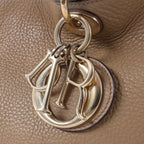 Bolso de mano mediano de dos vías de piel Cannage de Christian Dior en color camello