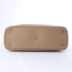 Bolso de mano mediano de dos vías de piel Cannage de Christian Dior en color camello