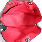 Bolso de mano mediano de dos vías de piel Cannage de Christian Dior en color camello