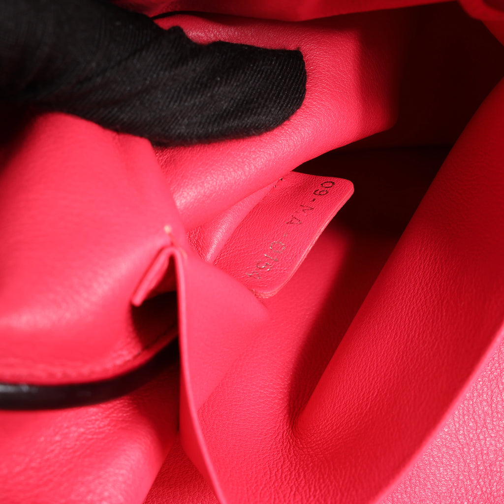 Bolso de mano mediano de dos vías de piel Cannage de Christian Dior en color camello