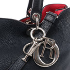 Bolso de mano mediano de dos vías de piel Cannage de Christian Dior en color camello