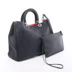 Bolso de mano mediano de dos vías de piel Cannage de Christian Dior en color camello