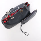 Bolso de mano mediano de dos vías de piel Cannage de Christian Dior en color camello