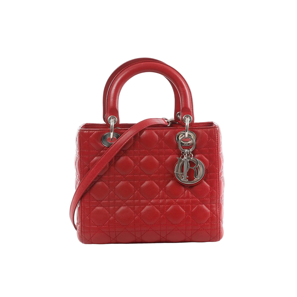 Red Dior Lady Dior Cannage quilted leather handbag with top handles, detachable shoulder strap, and silver-tone DIOR letter charm