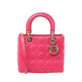 Pink Christian Dior Lady Dior Medium Cannage leather handbag with dual top handles, slim shoulder strap and gold-tone DIOR charms.