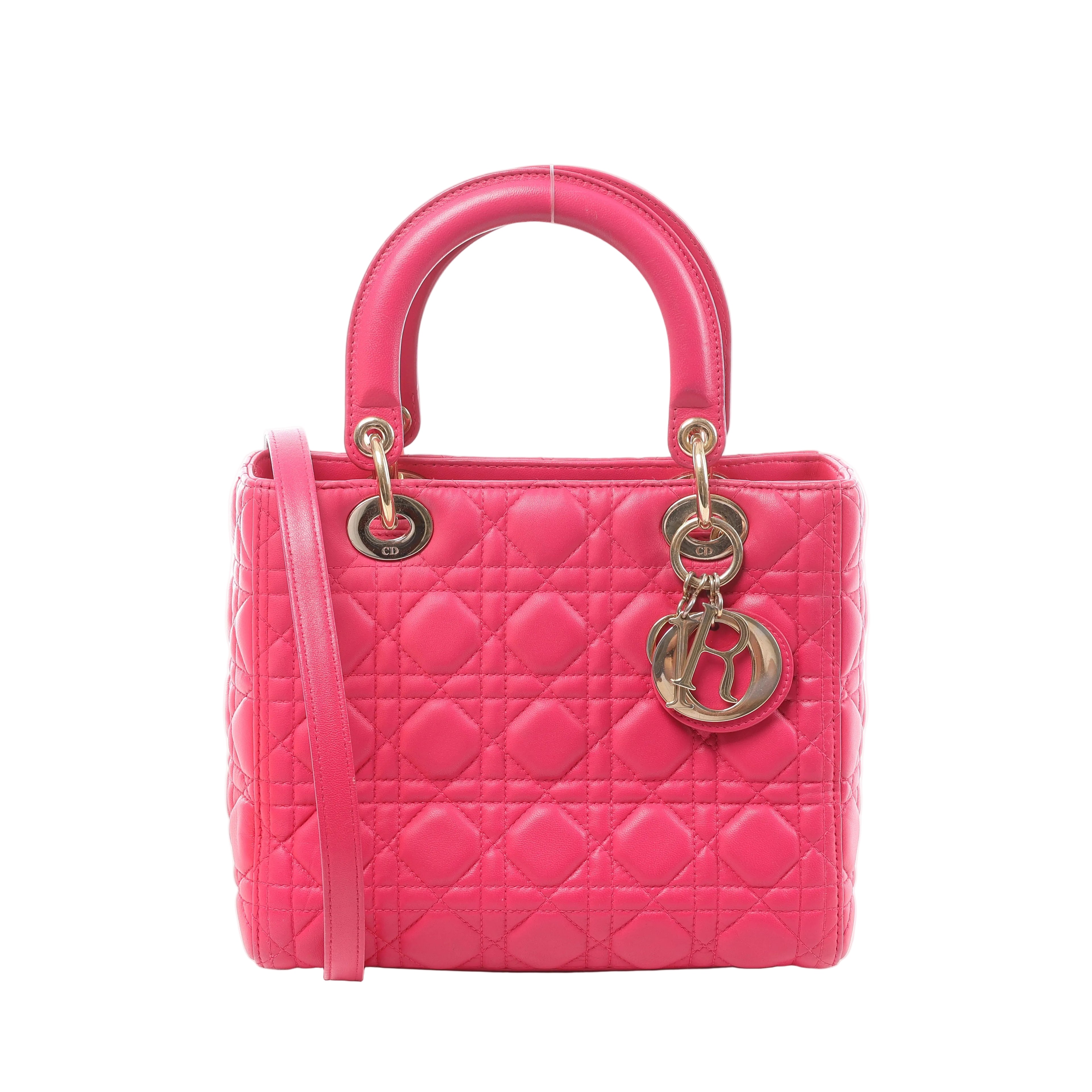 Pink Christian Dior Lady Dior Medium Cannage leather handbag with dual top handles, slim shoulder strap and gold-tone DIOR charms.