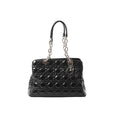 Black Dior Lady Dior large patent leather bag with Cannage quilting, silver-tone chain and leather handle straps, and hanging Dior letter charm