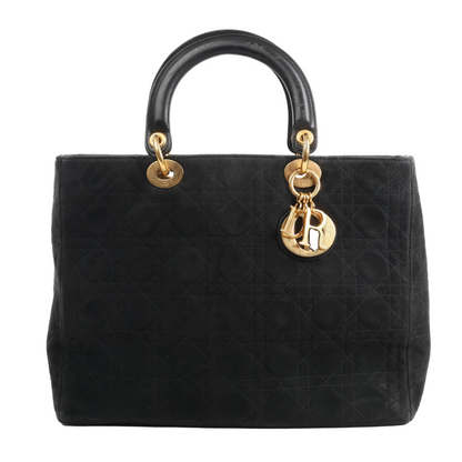 Dior Lady Dior Large 2Way Handbag in black suede with cannage stitching, black leather top handles, and gold-tone hardware including signature Dior letter charms, displayed against a white background.