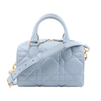 Dior MacroCannage Groove 20 handbag in light blue quilted leather with rounded top handles, a detachable strap and gold-tone hardware.