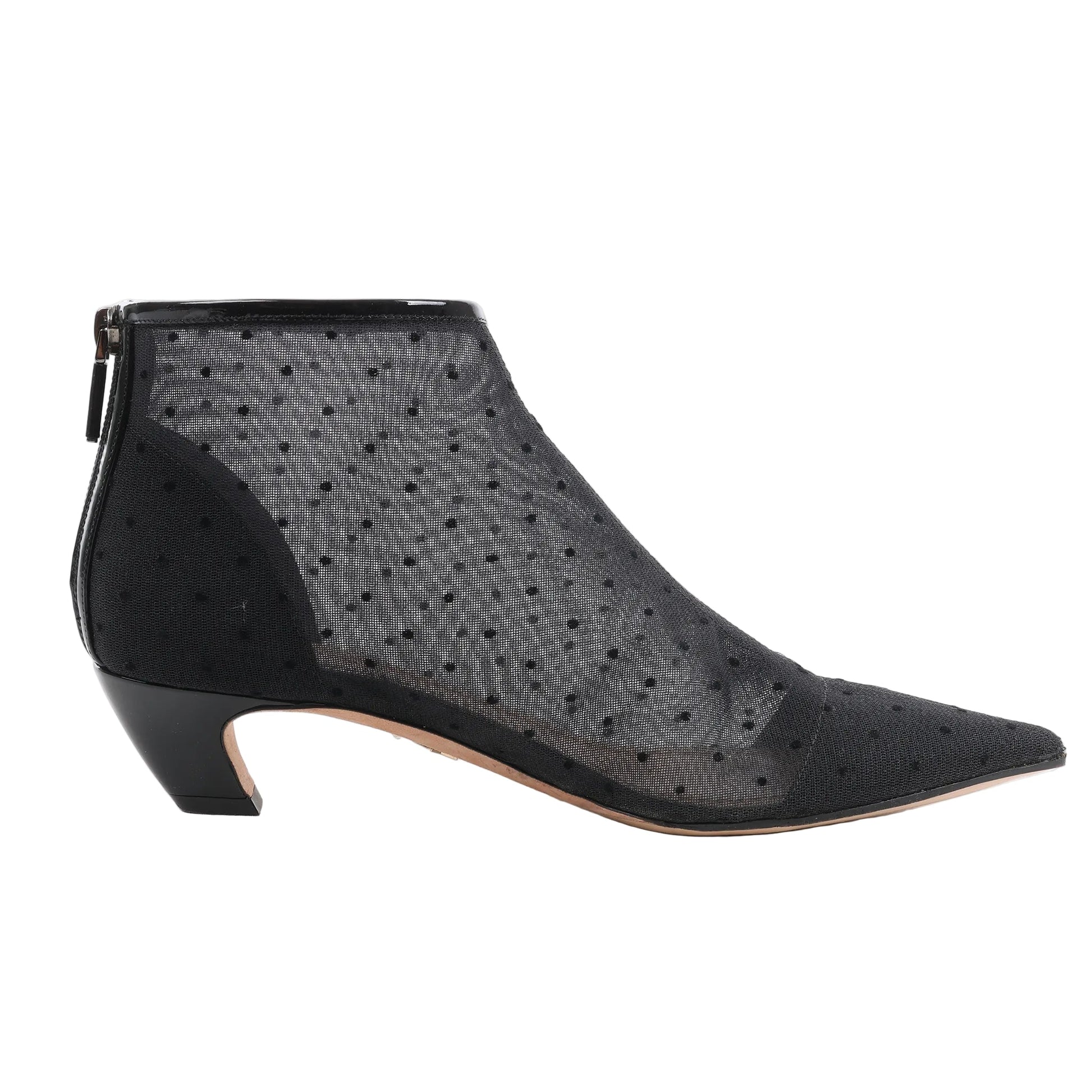 Dior Pretty black ankle boots in mesh with polka-dot texture, pointed toe, low curved heel, and back zipper closure, shown in a side profile against a white background.