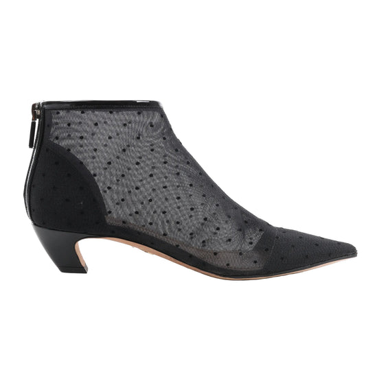 Dior Pretty black ankle boots in mesh with polka-dot texture, pointed toe, low curved heel, and back zipper closure, shown in a side profile against a white background.