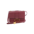 Pink Dior 30 Montaigne leather crossbody bag with gold-tone CD clasp, flap front, and adjustable strap with gold buckle on white background.