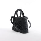 Bolso de mano mediano de dos vías de piel Cannage de Christian Dior en color camello