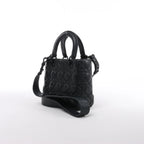 Bolso de mano mediano de dos vías de piel Cannage de Christian Dior en color camello