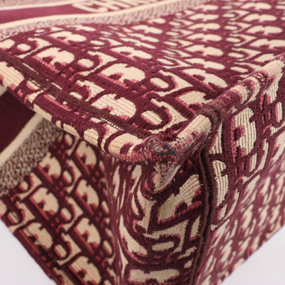 Grand sac bandoulière oblique en toile Christian Dior Book Tote bordeaux