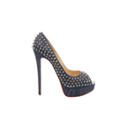 Side view of a Christian Louboutin navy denim pump with silver-tone spike studs, an open toe, raised platform, slim stiletto heel and visible red sole.