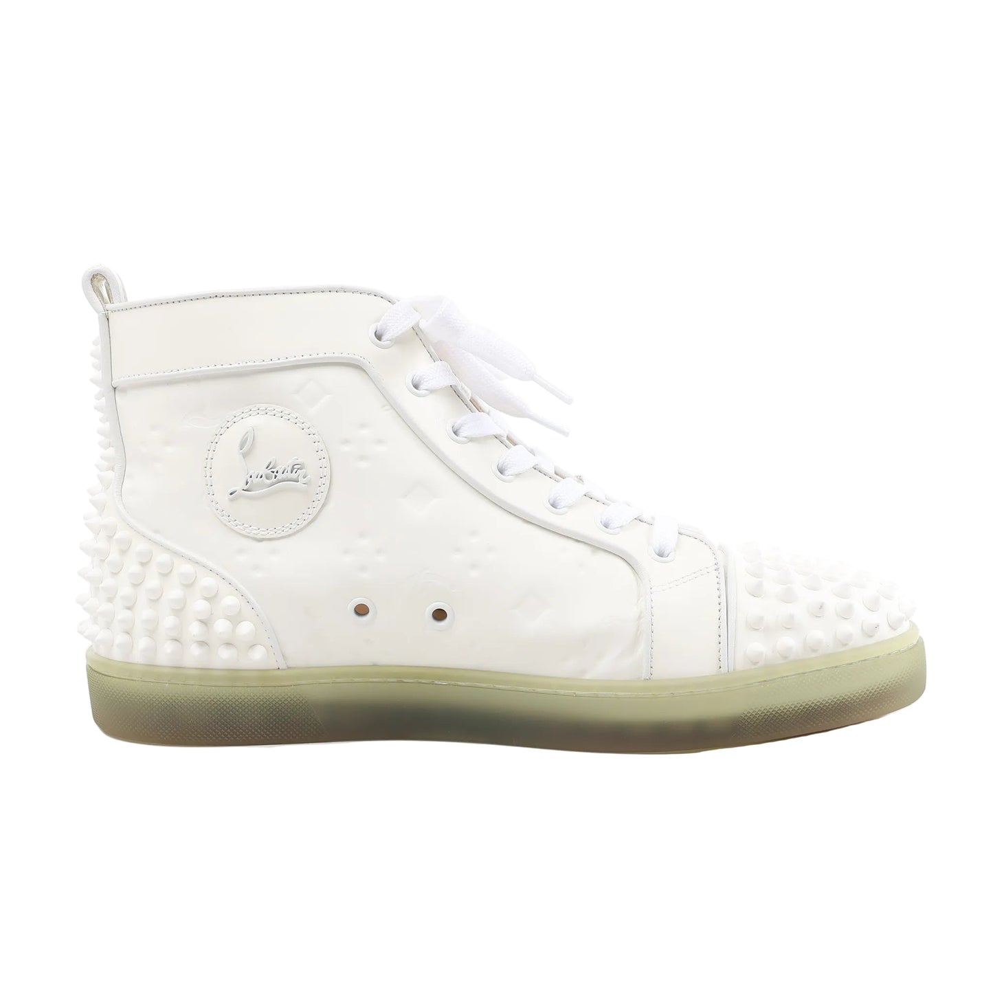 Side view of a white Christian Louboutin leather high-top sneaker in size 42.5 EU, showcasing tonal rubber spikes on the toe and heel, white laces, embossed logo patch, and a translucent green-tinted sole.