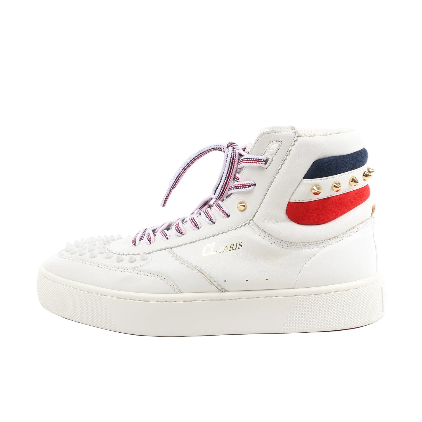 Side view of a white Christian Louboutin leather high-top sneaker in size 42.5 EU, featuring spiked toe detailing, red-white-blue laces, tricolor suede heel panels, and gold-tone studs on a white rubber sole.