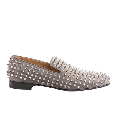 Christian Louboutin slip-on shoes in gray leather, fully embellished with silver-tone spike studs, low heel, and signature red sole. Size 43 EU.
