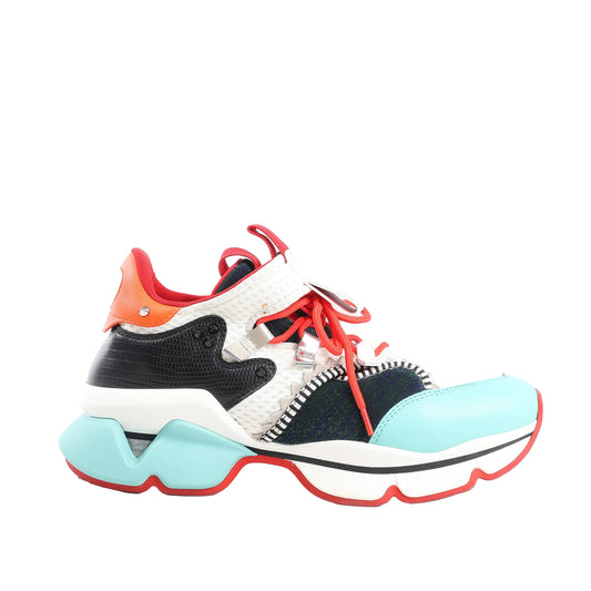 Christian Louboutin Red Runner Sneakers in multicolor, Size 42 EU, featuring a mix of white mesh, black textured leather, turquoise and orange leather panels, red laces, and chunky red rubber soles, displayed in a side profile against a white background.