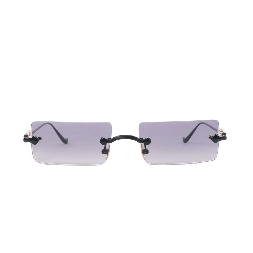 Rimless rectangular sunglasses with gray gradient lenses, black bridge and gold-tone side hardware on a white background.