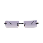 Rimless rectangular sunglasses with gray gradient lenses, black bridge and gold-tone side hardware on a white background.