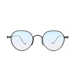 Chrome Hearts round sunglasses with black metal frames, light blue gradient lenses, and cross-style hinge accents on a white background.