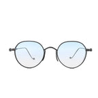 Chrome Hearts round sunglasses with black metal frames, light blue gradient lenses, and cross-style hinge accents on a white background.