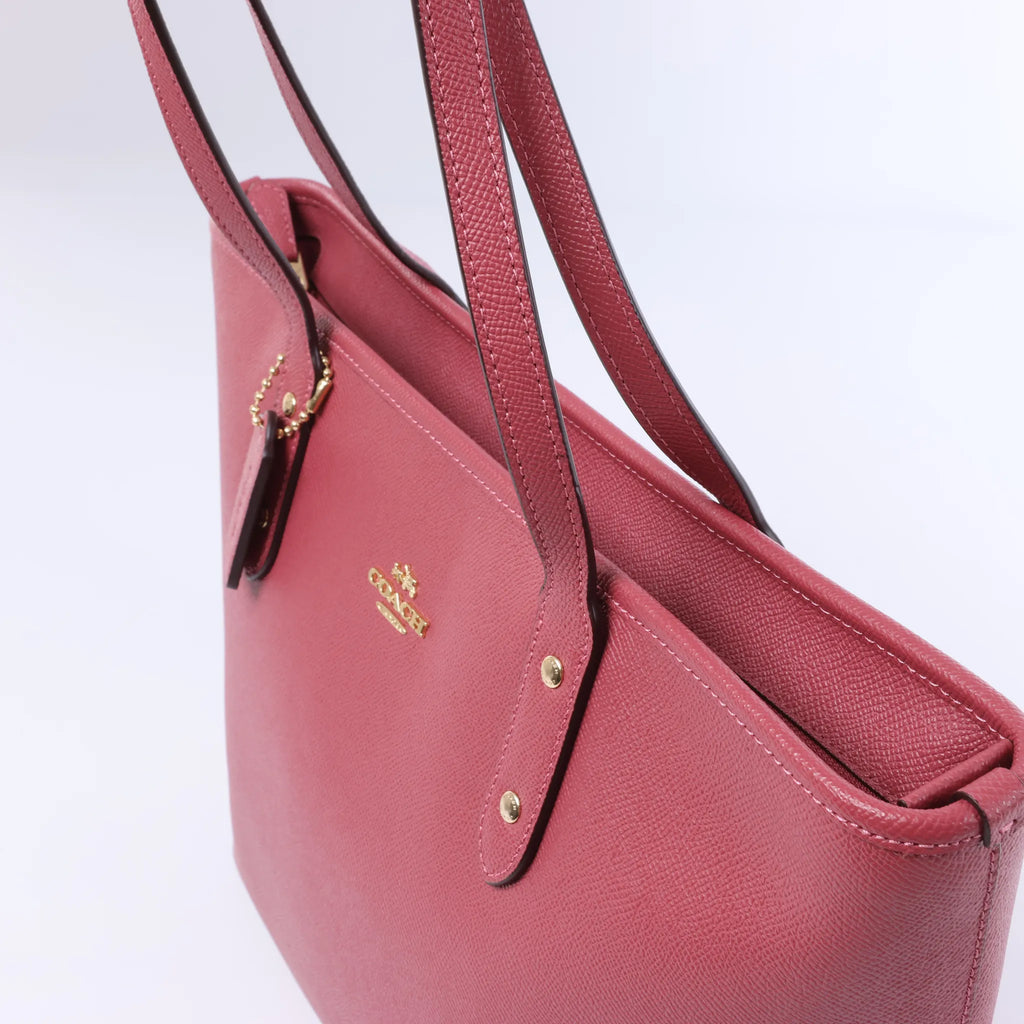 Bolso de hombro Coach City de cuero en rosa