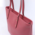 Bolso de hombro Coach City de cuero en rosa