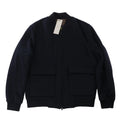 Corneliani O.Wear navy blue bomber jacket with full zip-front closure, ribbed collar, cuffs and hem, and two large flap front pockets, laid flat on a white background.