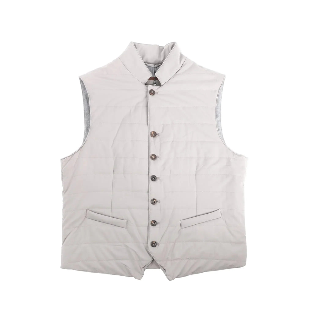 Light gray Corneliani gilet vest with stand collar, button-front closure, horizontal quilting, and two welt pockets, size 50 IT.