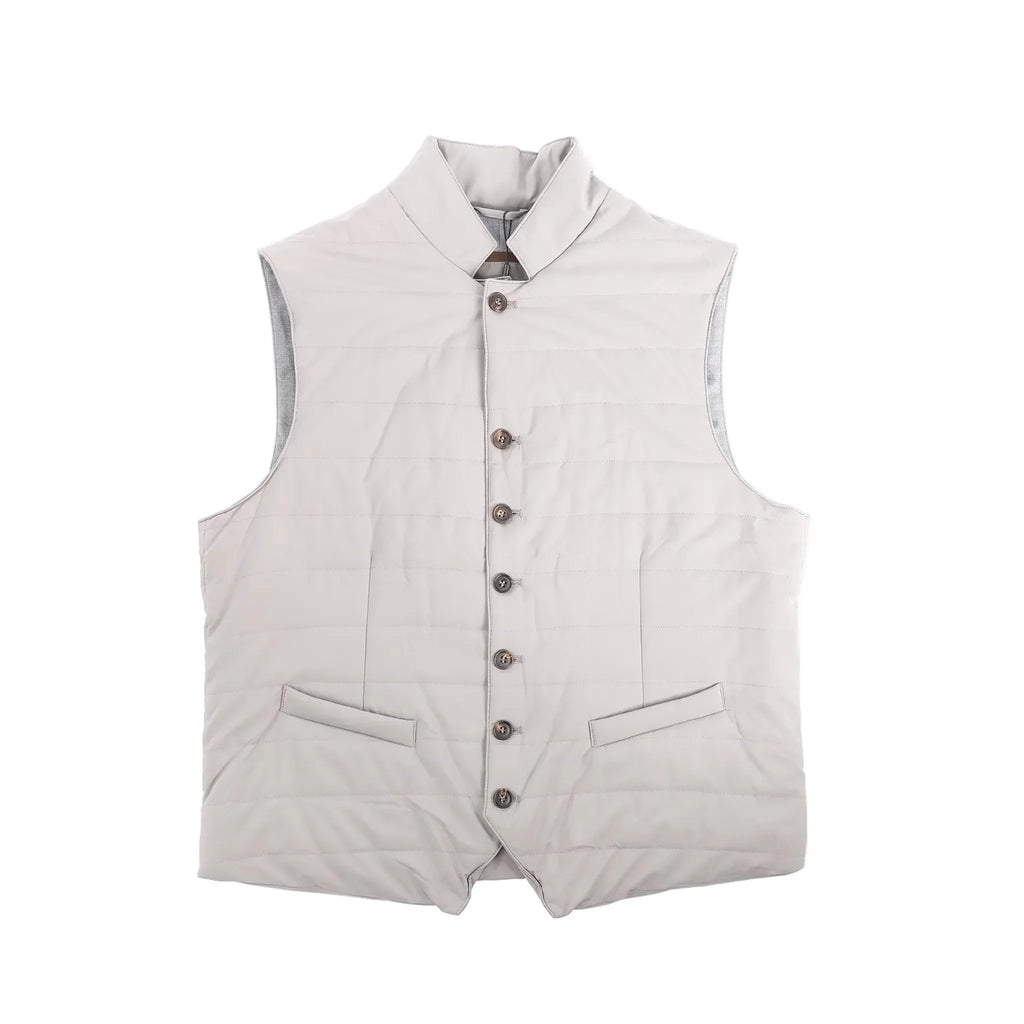 Light gray Corneliani gilet vest with stand collar, button-front closure, horizontal quilting, and two welt pockets, size 50 IT.