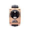 De Grisogono FG ONE watch with black dial, ribbed 18k pink gold case, black leather strap and curved numeral displays.
