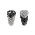 De Grisogono heart-shaped earrings in white gold, featuring a striking combination of white and black pave-set diamonds in an asymmetrical design, displayed against a white background.