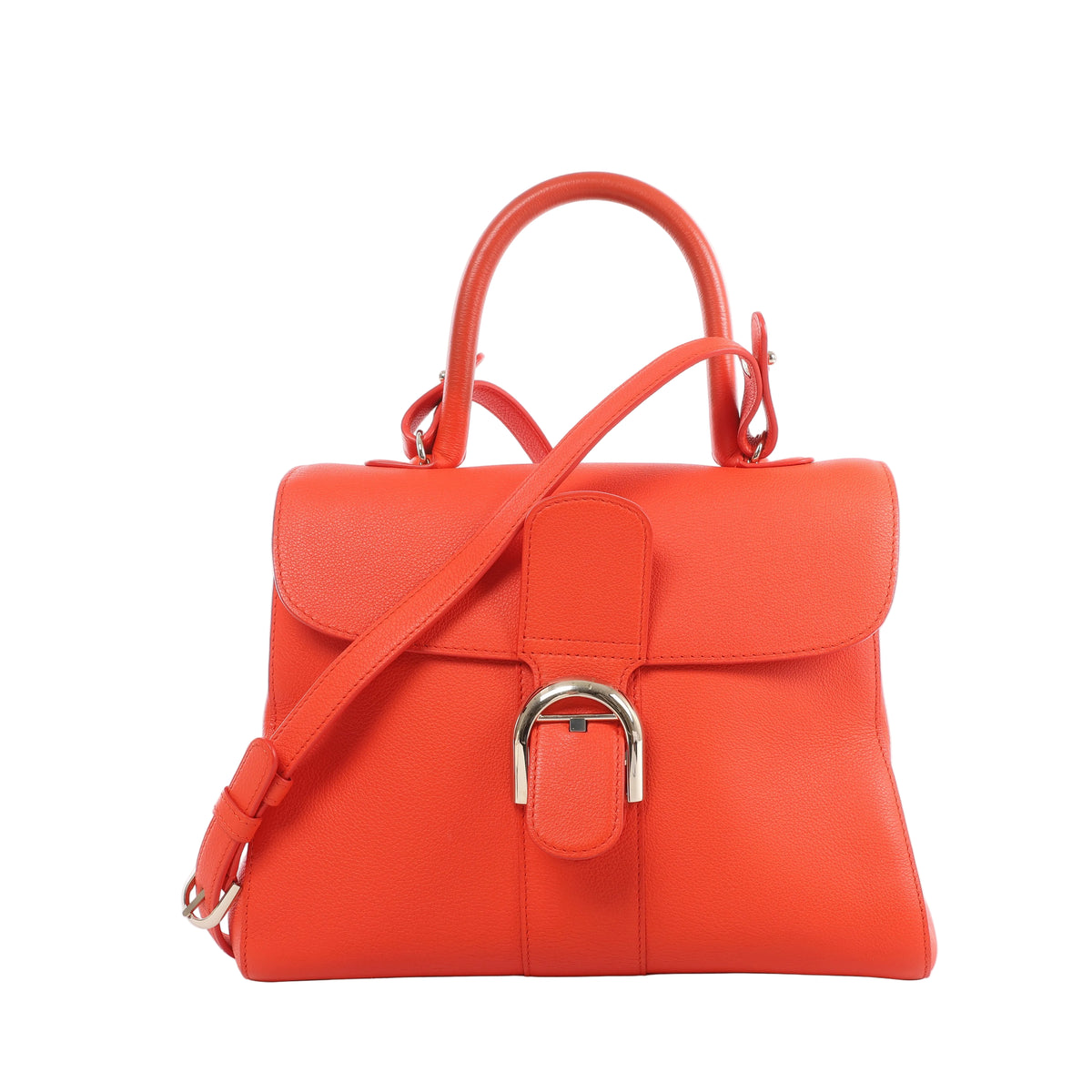 Orange Delvaux Brillant MM grained leather handbag with a curved top handle, matching shoulder strap, rounded front flap and silver-tone buckle.