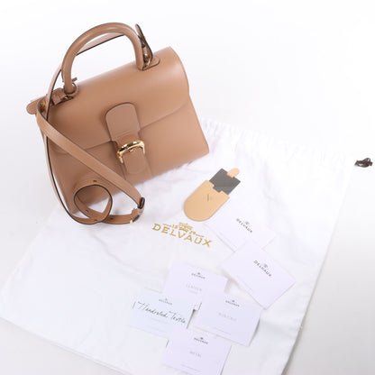 Sac à main double usage en cuir Delvaux Brillant MM beige