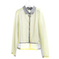 DIESEL long-sleeved shirt in sheer yellow fabric with metallic lurex detail, featuring a gray contrast collar, button placket, and hem accents, shown on a hanger in size S.