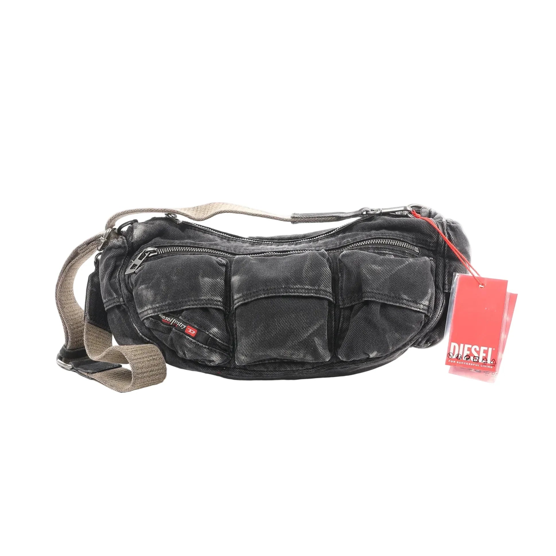 Washed gray denim Diesel crossbody bag with multiple front pockets, zip-top closure, wide adjustable strap, and red Diesel hangtag.