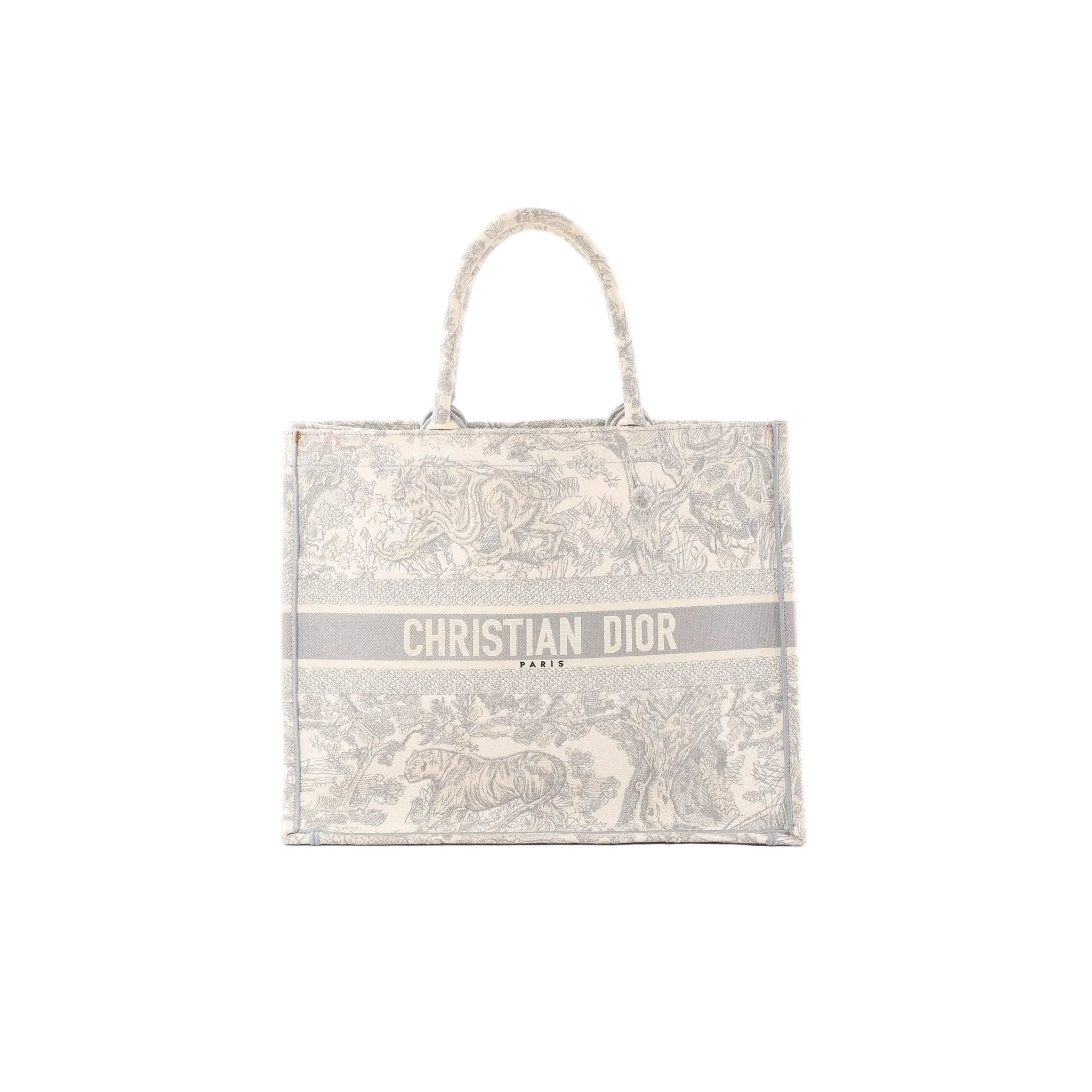 Dior Book Tote Large in gray toile Jouy embroidered canvas with top handles and “CHRISTIAN DIOR PARIS” logo band on the front.