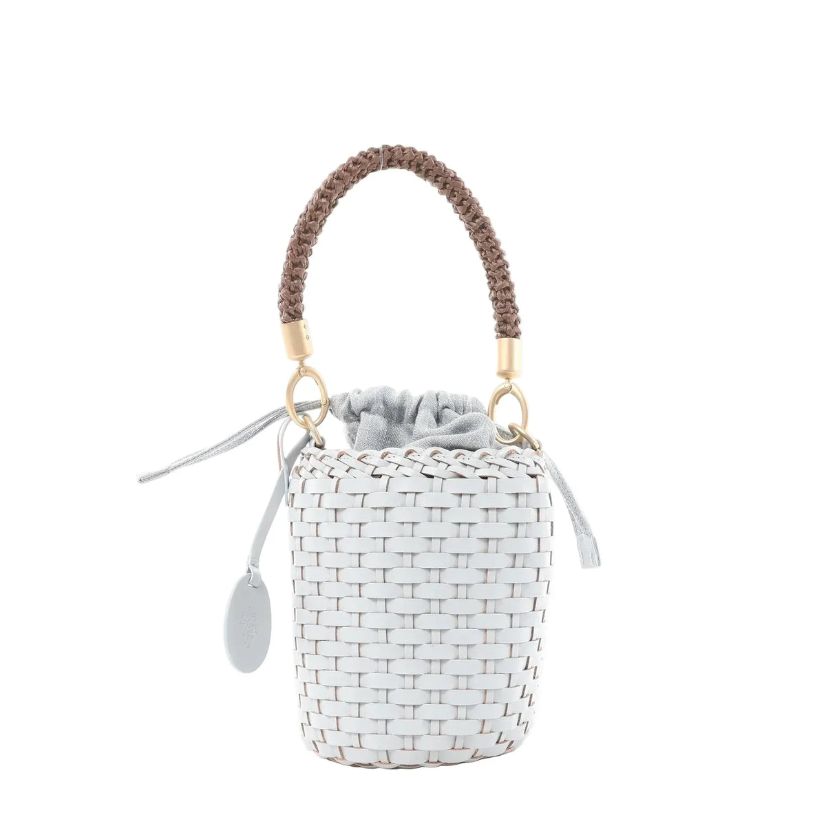 Woven leather mini top-handle bag with gray drawstring pouch closure, braided brown handle, gold-tone rings, and hanging round logo tag